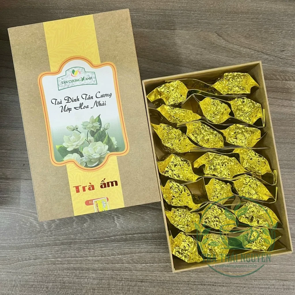 Chi tiết bên trong trà nhài tiến quan 100g tân cương xanh